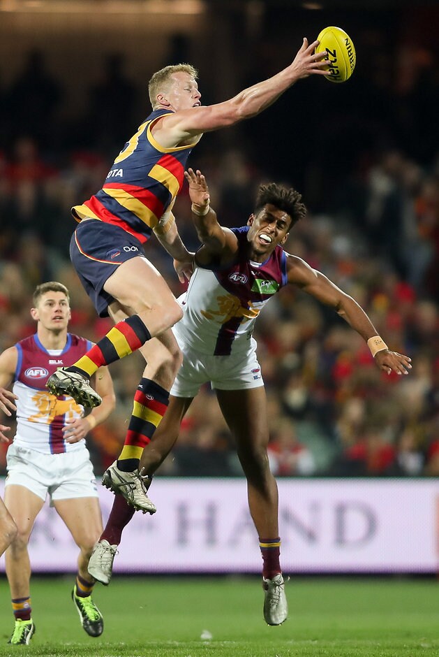 AFL 2016 Rd 20 - Adelaide v Brisbane ADELAIDE, AUSTRALIA - AUGUST 06: Reilly O'Brien of the Crows clashes with Archie Smith of the Lions during the 2016 AFL Round 20 match between the Adelaide Crows and the Brisbane Lions at Adelaide Oval on August 06, 2016 in Adelaide, Australia. (Photo by AFL Media)